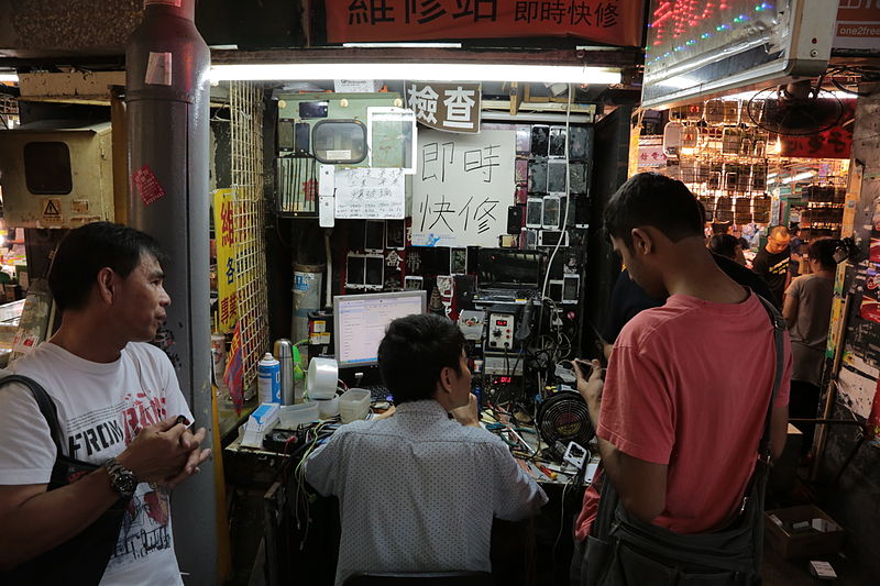 Cabine de réparation de téléphones en Asie